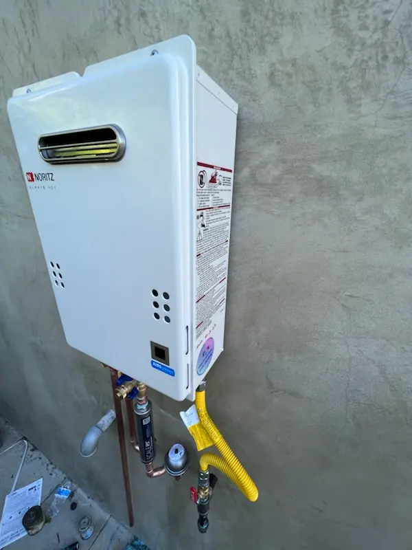 Tankless water heater installation for Sun Village homes